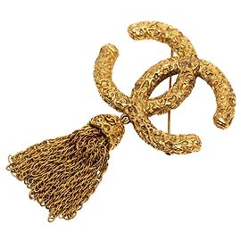Chanel CC Brosche mit Quaste und Lava-Fransen vergoldet Golden