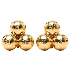 Orecchini a clip Chanel CC sfere placcate oro D'oro