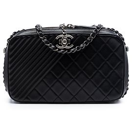 Bolsa de câmera Chanel Medium Quilted Lambskin Coco Boy preta Preto