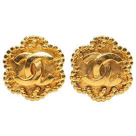 Boucles d'oreilles clips Chanel CC fleur plaqué or Doré