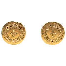 Boucles d'oreilles créoles Chanel Logo plaquées or Doré