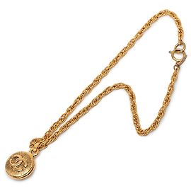 Colar com pingente redondo Sunburst com CC da Chanel banhado a ouro Dourado