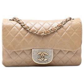 Borsa a tracolla Chanel Small Quilted Iridescent Lambskin Pearl CC Crystal Flap oro D'oro