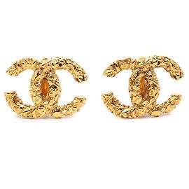 Boucles d'oreilles clips en lave plaquées or Gold Chanel CC Doré