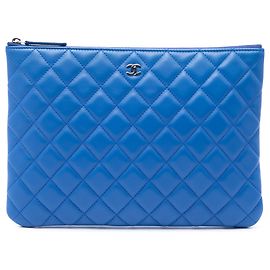 Blue Chanel Medium Quilted Lambskin O Case Clutch Blue