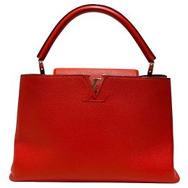 Bolsa Louis Vuitton Capucines MM Outro