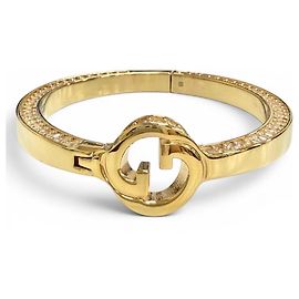 Bracciale rigido GUCCI Blondie con G interlocking e strass D'oro