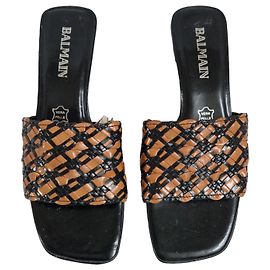 Balmain Mules en cuir tressé Marron Noir