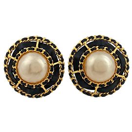 Orecchini a clip rotondi Chanel Nero Bianco D'oro