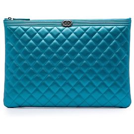 Blue Chanel Large Quilted Metallic Caviar Boy O Case Clutch Blue