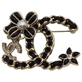 Spilla Chanel nera e oro con strass Nero D'oro