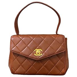 Bolsa mini de couro matelassê Chanel Rare Marrom