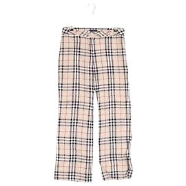 Calças slim Burberry em linho ecru Cru