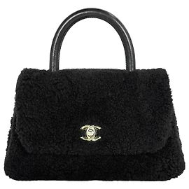 Chanel mala Coco Small em shearling Preta Preto