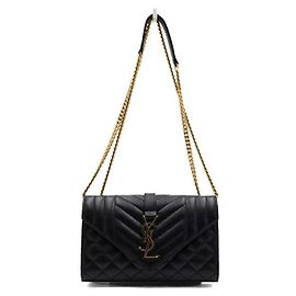 Saint Laurent Bolsa de ombro e crossbody acolchoada Monogram com corrente dourada e fecho envelope Preto