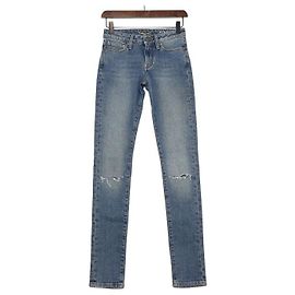 Saint Laurent Pantalones vaqueros denim destroyed para mujer Azul