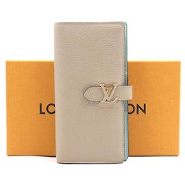 Louis Vuitton Vertical Taurillon Leather Wallet Orange