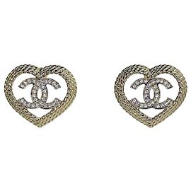Chanel Orecchini a cuore con logo CC mai usati D'oro