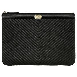 Chanel Boy New Medium Clutch Chevron Gold Hardware Black Series Caviar Black