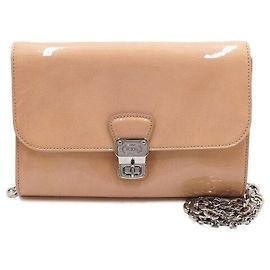 Tod's Bolsa de ombro em verniz bege com corrente Marrom