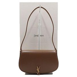 Saint Laurent Bolsa de ombro meia-lua Mini Voltaire em couro de bezerro Dark Cocoa Preto