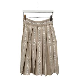 Hermès Jupe plissée en maille imprimée motif Chandal Chenetangcle Marron
