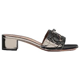 Dior Mules de salto Cannage em pele de cordeiro acolchoada preta Preto