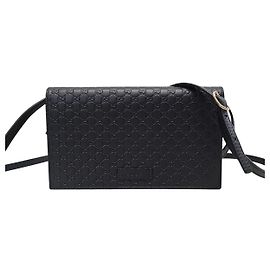 Gucci Borsa a tracolla mini GG Microsima in pelle nera Nero