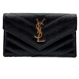 Saint Laurent Tarjetero con solapa Monogram Negro