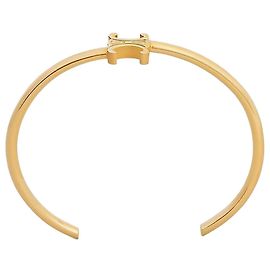 Céline Bracelete assimétrico em latão com acabamento dourado Dourado