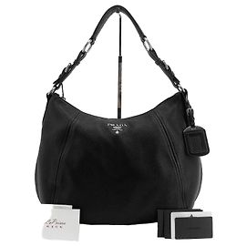 Balenciaga Bolsa hobo em couro com logo triangular, bolsa de ombro Preto