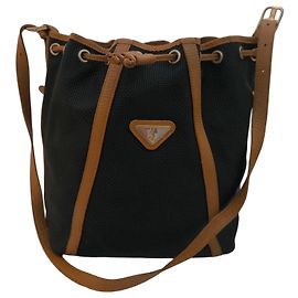 Yves Saint Laurent Borsa a secchiello in tela nera e pelle marrone Marrone Nero