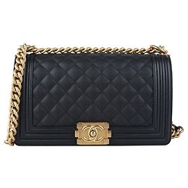 Chanel Sac Boy Flap en cuir Caviar Gold Medium Noir