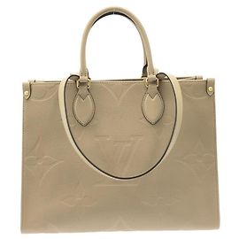 Bolsa Louis Vuitton Monogram Empreinte OnTheGo MM Cinza