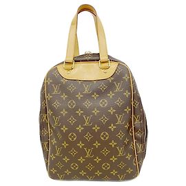 Bolsa Louis Vuitton Monogram Excursion Marrom