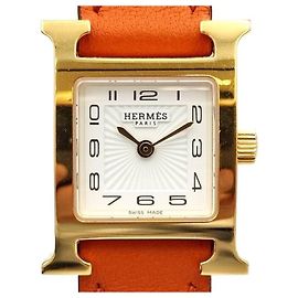 Hermès Relógio Hour de duas pulseiras banhado a ouro Dourado