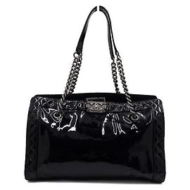 Chanel Borsa a tracolla Reverso Boy in vernice nera con catena Nero