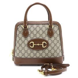 Gucci Picca borsa con manico e morsetto Marrone