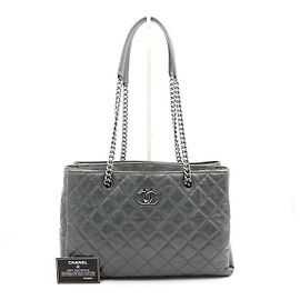 Chanel Borsa a tracolla vintage in pelle di vitello con catena CC argentata Marrone