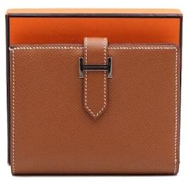 Hermès Gold Compact Wallet with Silver Hardware Golden