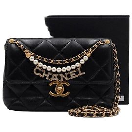 Chanel Borsa a tracolla e crossbody in pelle caviar nera con perle e catena vintage dorata CC Nero