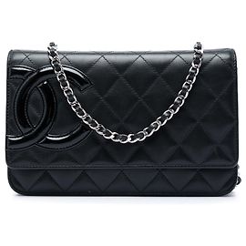 Chanel Carteira com corrente Cambon Ligne em pele de cordeiro acolchoada preta Preto
