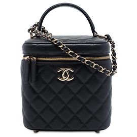 Chanel Vanity com alça superior e corrente, couro caviar matelassé preto CC Preto