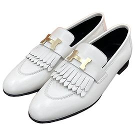 Hermès Mocassin Royal Beige avec détails dorés Marron