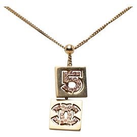 Collier pendentif Chanel No. 5 Coco Mark Doré