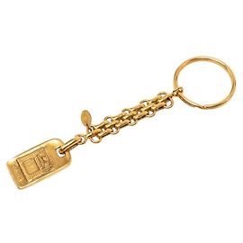 Porte-clés breloque à plaque logo Chanel Doré