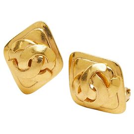Orecchini vintage Chanel Coco Mark motivo diamante D'oro