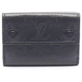 Cartera compacta Discovery Louis Vuitton en Monogram Shadow negro Negro