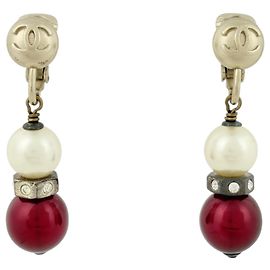 Boucles d'oreilles clips Chanel plaquées or avec strass Doré