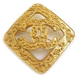 Broche en métal doré Chanel Doré